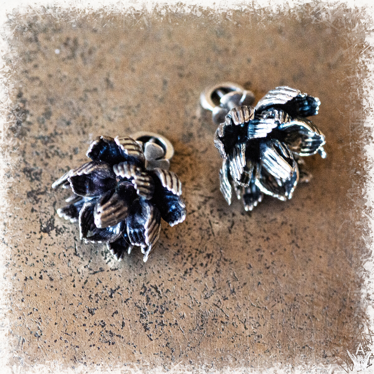 This image content: the earrings with lotus, silver jewelry, Ornamental lotuses; the collection of jewelry “Lotus of Unity”, pure lotuses, jewelry by Alisa Skvortsova;