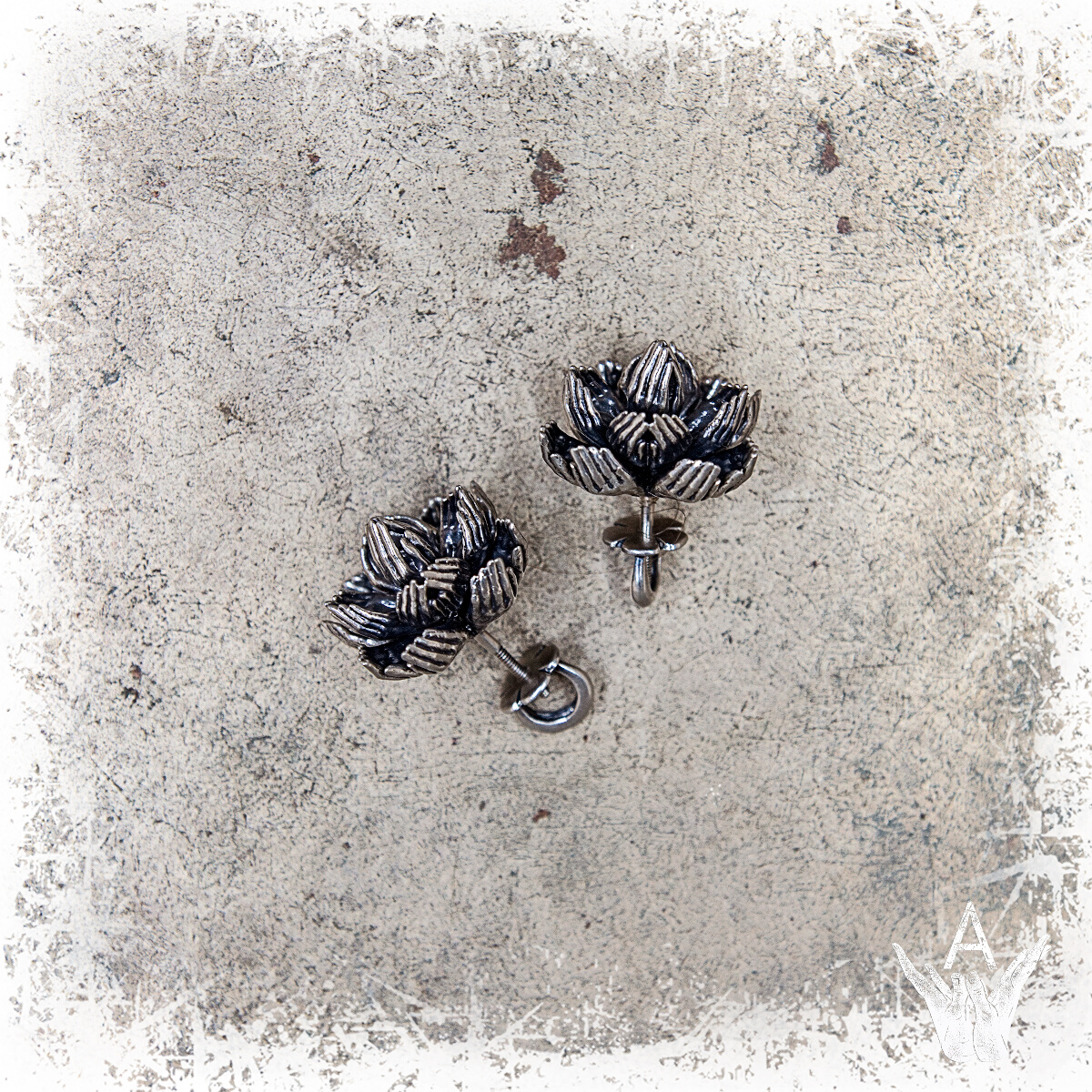 This image content: Silver earrings, Ornamental lotuses; the collection of jewelry “Lotus of Unity”, beauty lotuses, jewelry by Alisa Skvortsova;