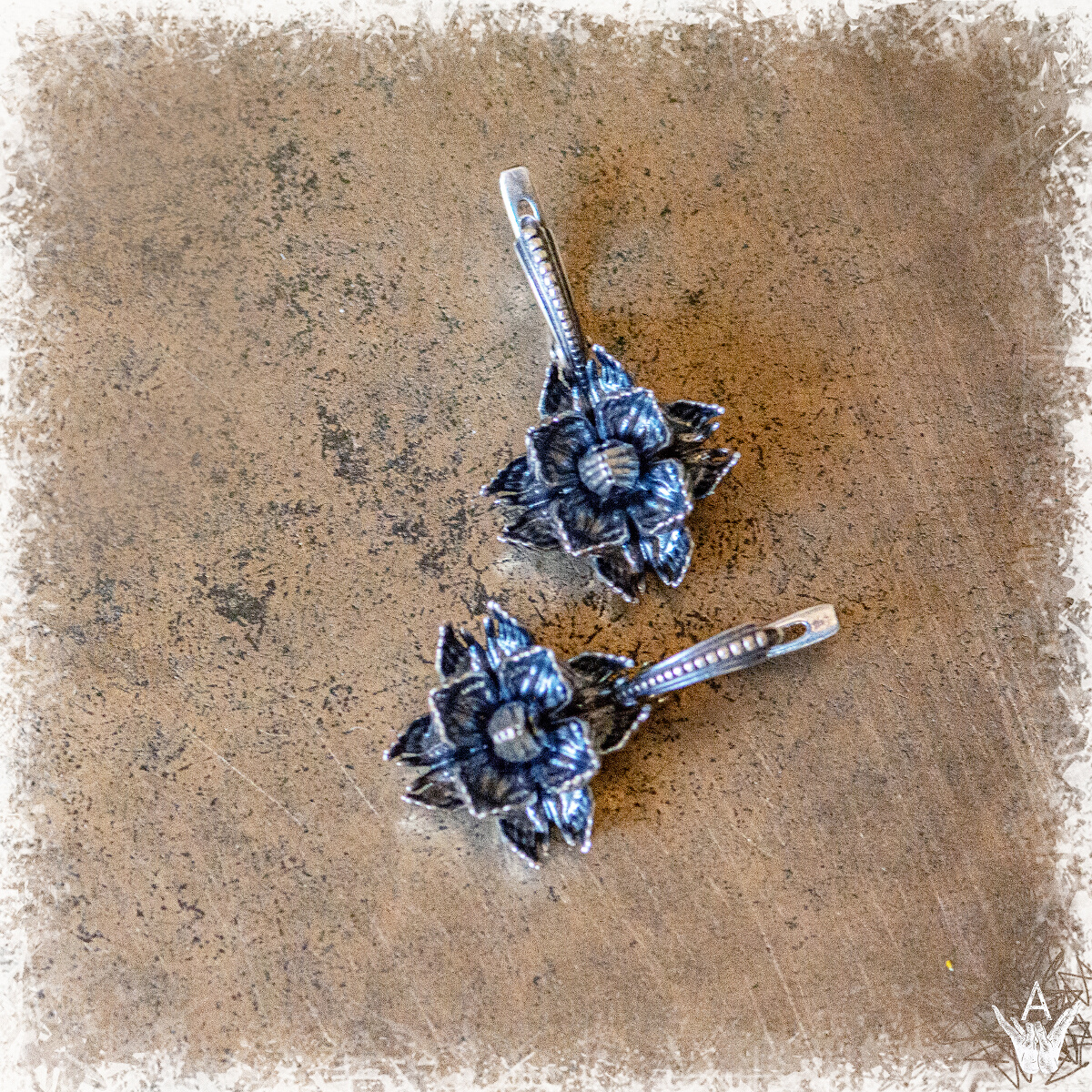 This image content: Lotus earrings of silver, Lotuses of silver; the collection of jewelry “Unity Lotus”, clear lotuses, jewelry by Alisa Skvortsova;